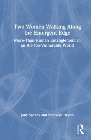 Two Women Walking Along the Emergent Edge