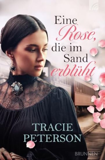 Eine Rose, die im Sand erblüht