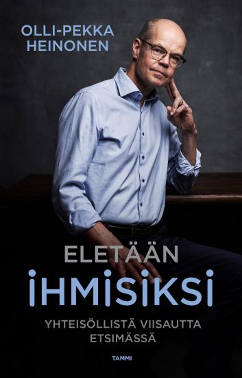 Eletään ihmisiksi – Olli-Pekka Heinonen, kirjan kansikuva